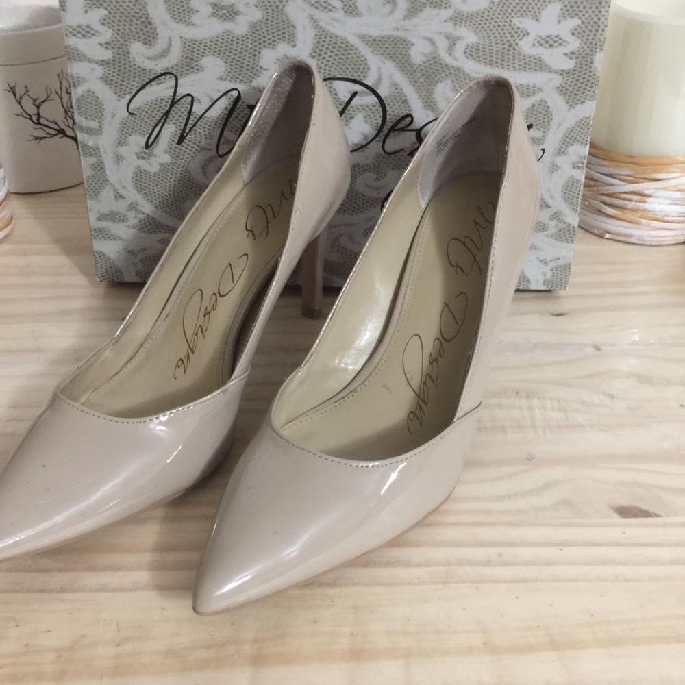 MTi Design  cream color pumps.